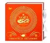 Calendario arancione Mariage Frères Christmas Rhapsody con decorazioni dorate e un nastro bianco