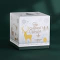 Hvid kubeformet adventskalender med te fra Nordqvist og et gyldent rensdyrmotiv