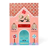 Lukket DAVIDsTEA 24 Days of Tea-kalender med lyserødt husmotiv