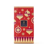 Geschlossener roter Whittard Tee-Adventskalender 2026 mit Weihnachtskugelmuster