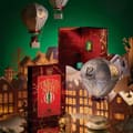 TWG Tea Twelfth Night-kalender i en oplyst papirlandsby med balloner