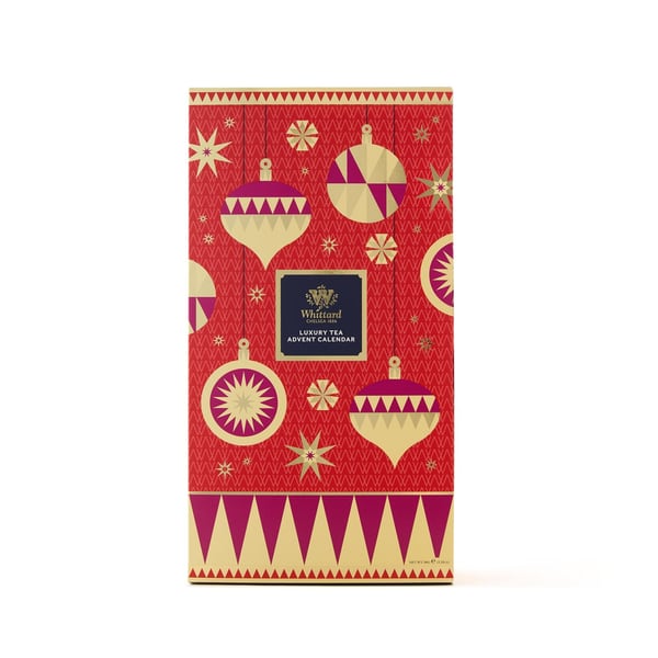 Geschlossener roter Whittard Tee-Adventskalender 2026 mit Weihnachtskugelmuster
